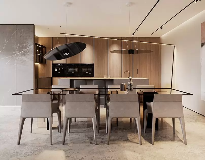 Comedor moderno con mesa de vidrio y sillas tapizadas en apartamento pequeño